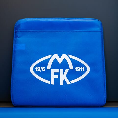 Sitteunderlag m/håndtak og lomme